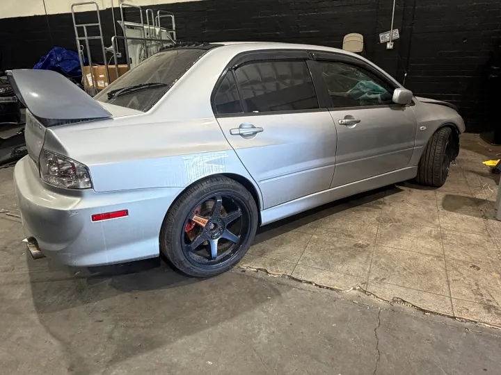 Silver sedan in the service bay at Top Speed Auto Center, Van Nuys